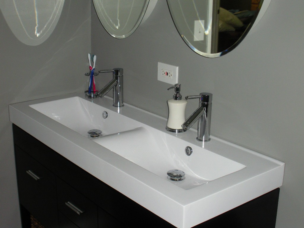 large bathroom sink two faucets