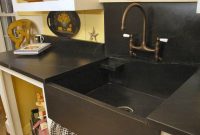 Traditional Kitchen Designed With Black Countertops And Stone Sink with sizing 1024 X 768