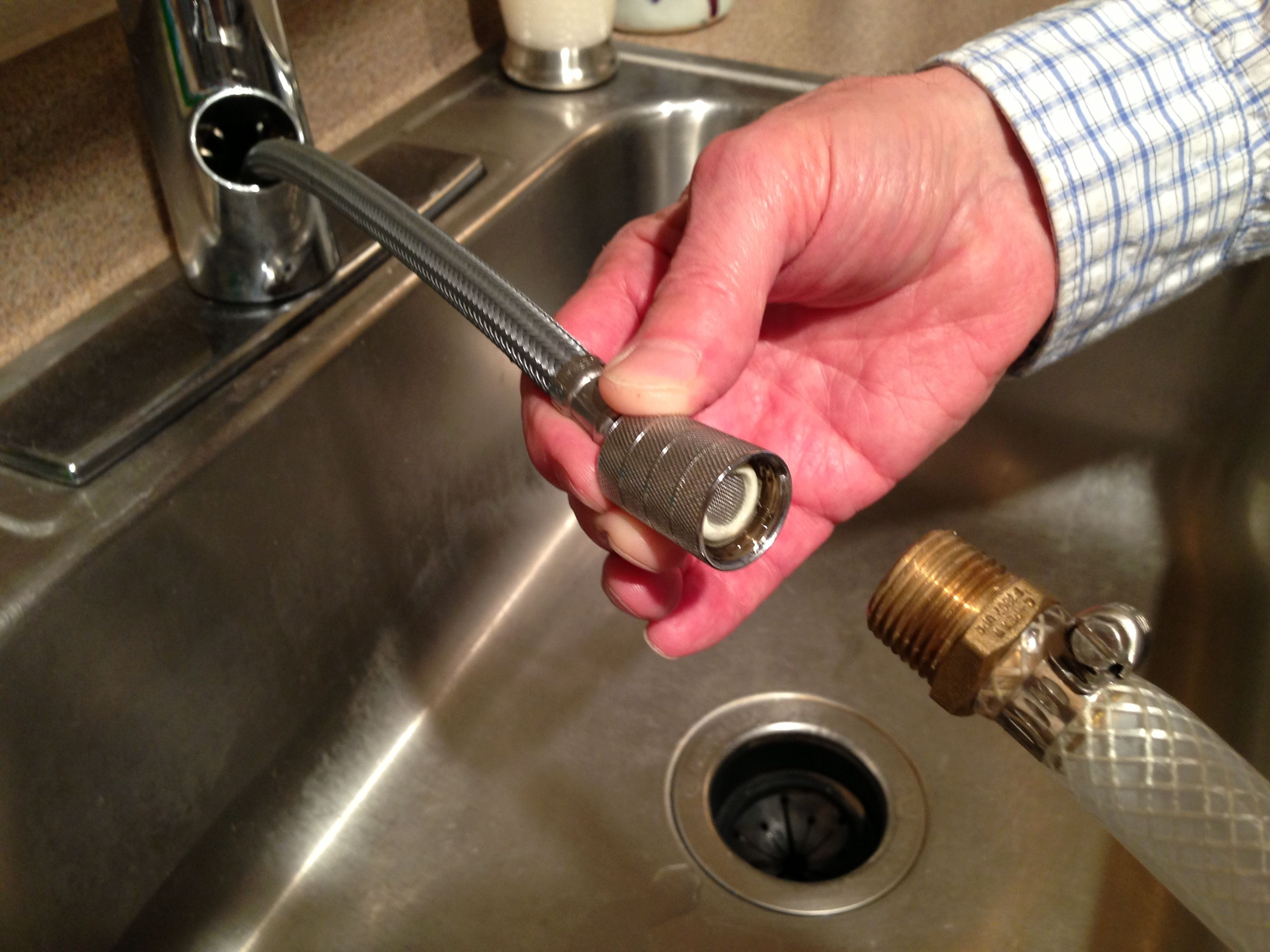 attach hose to bathroom sink