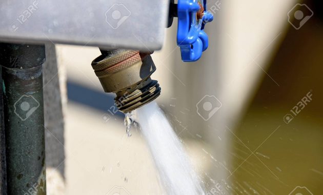 Water Spraying Out Of Outdoor Faucet Stock Photo Picture And inside proportions 1300 X 867