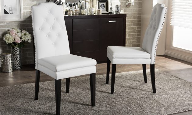 Baxton Studio Dylin Contemporary White Faux Leather With Button Tufted Nail Heads Trim Dining Chair Set Of 2 inside measurements 2000 X 2000