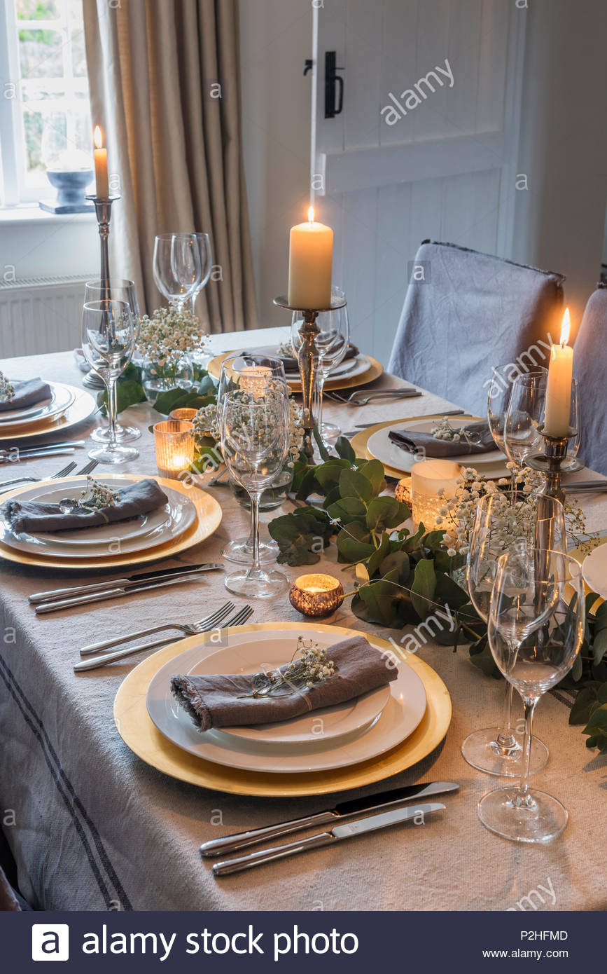 Candle Lit Dining Table Laid For A Festive Meal And Dressed pertaining to dimensions 867 X 1390