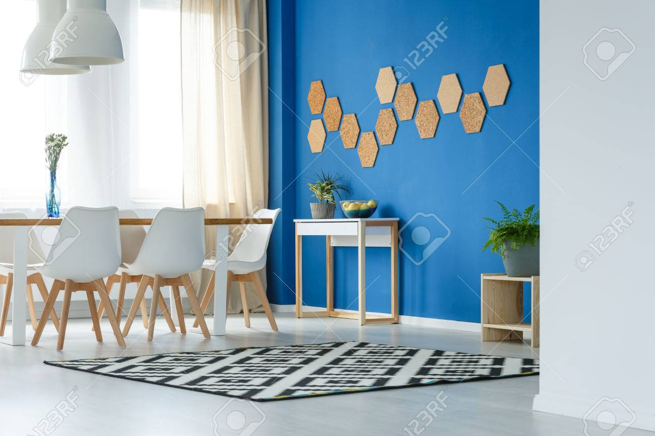 Contemporary Stylish Dining Room With Blue Wall Wooden Table with measurements 1300 X 866
