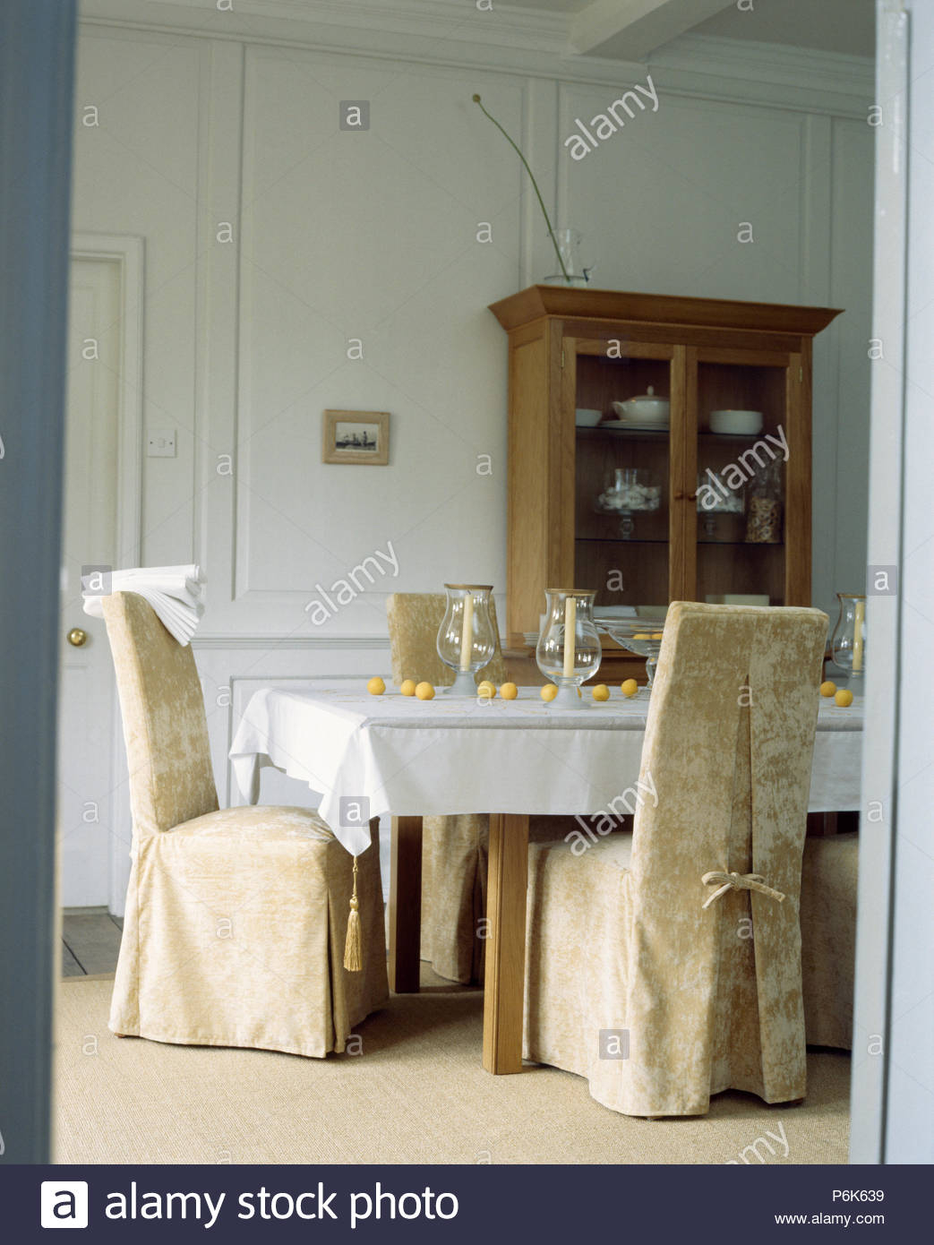 Cream Patterned Loose Covers On Chairs At Table With White within dimensions 1043 X 1390