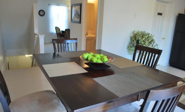 Dining Space Looking Into The Living Room And Kitchen At for measurements 2896 X 1944