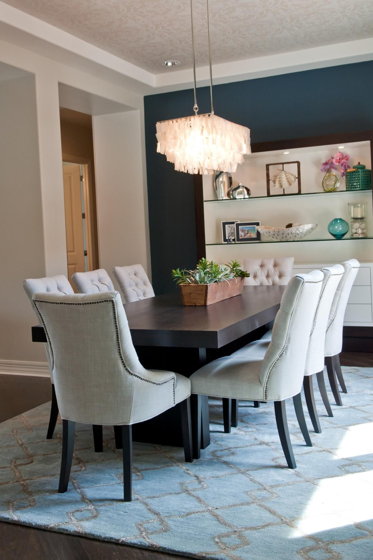 Eight Off White Tufted Chairs Surround A Dark Wood Table In inside dimensions 1280 X 1920