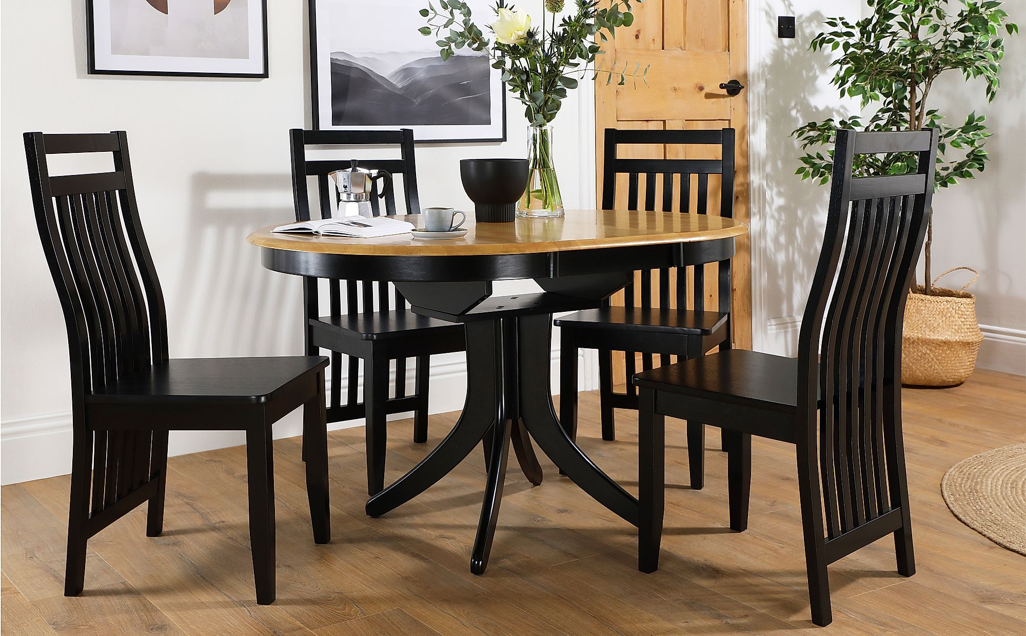 Hudson Round Painted Black And Oak Extending Dining Table With 4 Java Black Chairs for size 2000 X 1240