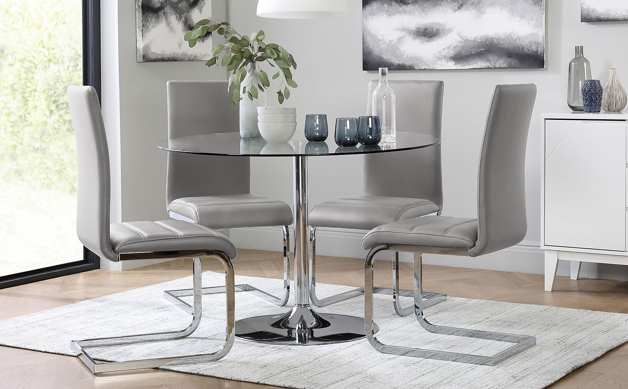 Orbit Round Glass Chrome Dining Table With 4 Perth Light Grey Leather Chairs within proportions 2000 X 1240