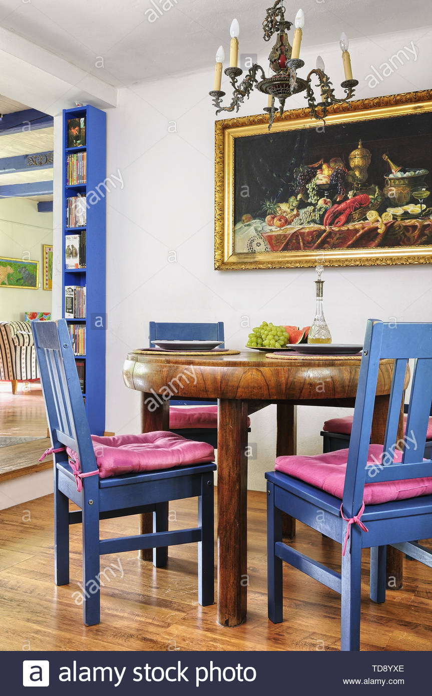 Round Wooden Dining Table With Blue Chairs In Dining Room Uk with regard to sizing 863 X 1390