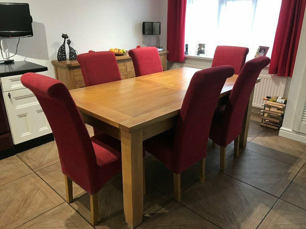 Solid Oak Extending Dining Table 8 Red Fabric Dining Chairs In Leeds West Yorkshire Gumtree pertaining to sizing 1024 X 768