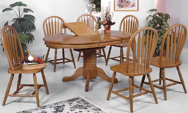 Windsor Solid 7 Piece Oval Dining Table And Side Chairs with proportions 1402 X 1170